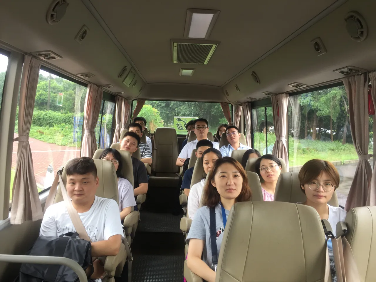 Employees in a shuttle bus